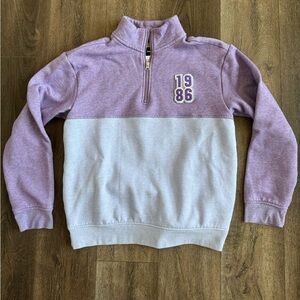 Purple and blue Quarter-Zip Sweatshirt, 1986 Original Use, women’s size medium.